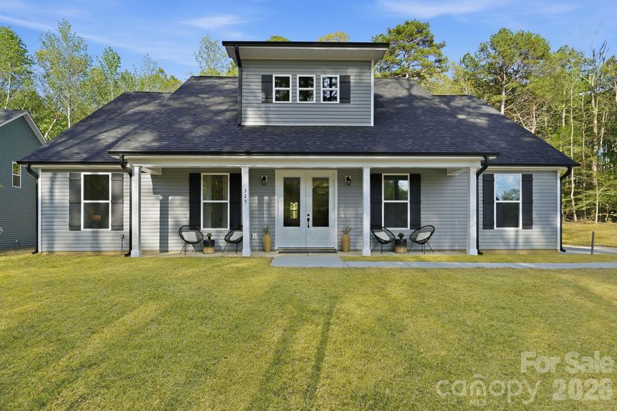 Welcome to your Brand New, Ranch Home on a large 2+ acre, private lot and right across the street from High Rock Lake!! Enjoy the expansive covered front porch that is perfect for a couple rocking chairs or swing. Walk inside the double front doors to tall ceilings & LVP flooring throughout the Home! Office/Study located off of the foyer with French doors. Open floor plan of the Family Room & Kitchen which is perfect for family gatherings or entertaining company. Luxury quartz countertops in the Kitchen with an oversized island, walk-in pantry, & a plethora of soft-close cabinets and drawers perfect. Formal Dining Room is right off of the Kitchen. A spacious Primary Bedroom features a spa-like Primary Bathroom with frameless tiled walk-in shower, double vanity with cultured marble countertops, and a vast walk-in closet. Home also provides two nicely sized Guest Bedrooms and additional Full Bathroom as well as Powder Room. The back patio allows you to take in the privacy of the mostly wooded back yard and all of your acreage! Boat slips, beaches and other access located a few minutes away allowing access onto High Rock Lake!