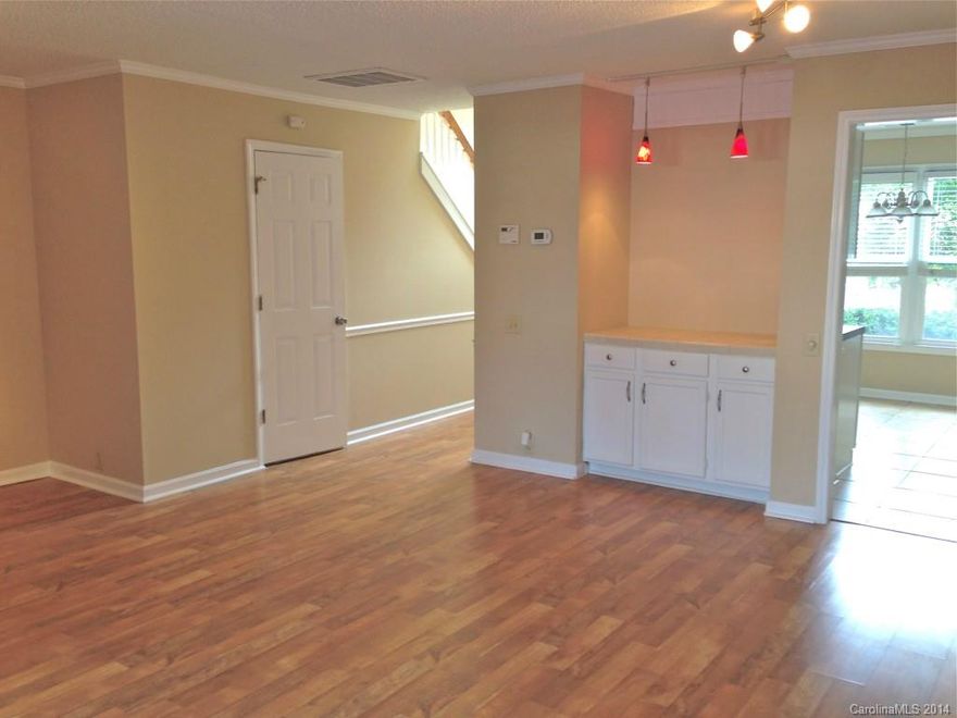 Wow! 2 story updated condo in sought after Quail Hollow area. Beautifully landscaped community with trees and green space abound.NEW windows. Move in ready. Laminate hardwoods/neutral finishes appeal to picky buyers. Modern lighting. Wood burning fireplace. Stainless appliances. New frieze carpet.Stamped concrete enclosed patio. Must See!