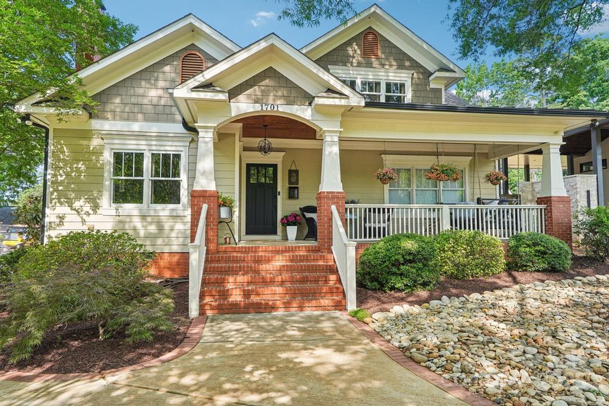 Award-Winning Design. Timeless Elegance. Premier Location. Step up to a welcoming front porch adorned with a custom-crafted swing, then enter a home where architectural excellence meets everyday comfort. Designed by award-winning architect Floyd Fowler—recognized specifically for this residence—every detail has been thoughtfully curated. The chef’s kitchen flows into a light-filled living room and elegant dining room. The main-level primary suite offers a serene retreat, with a Roman clay accent wall, dual walk-in closets, and a spa-inspired bath. One additional bedroom on the main and three more upstairs provide space for family, guests, or home office needs. Step into your private backyard sanctuary that you never want to leave—complete with a resort-style pool and waterfall, sunning deck, and a charming cabana with a bar crafted from reclaimed original wood. Professionally lit and landscaped, this secluded oasis is just minutes from Plaza Midwood neighborhood.
