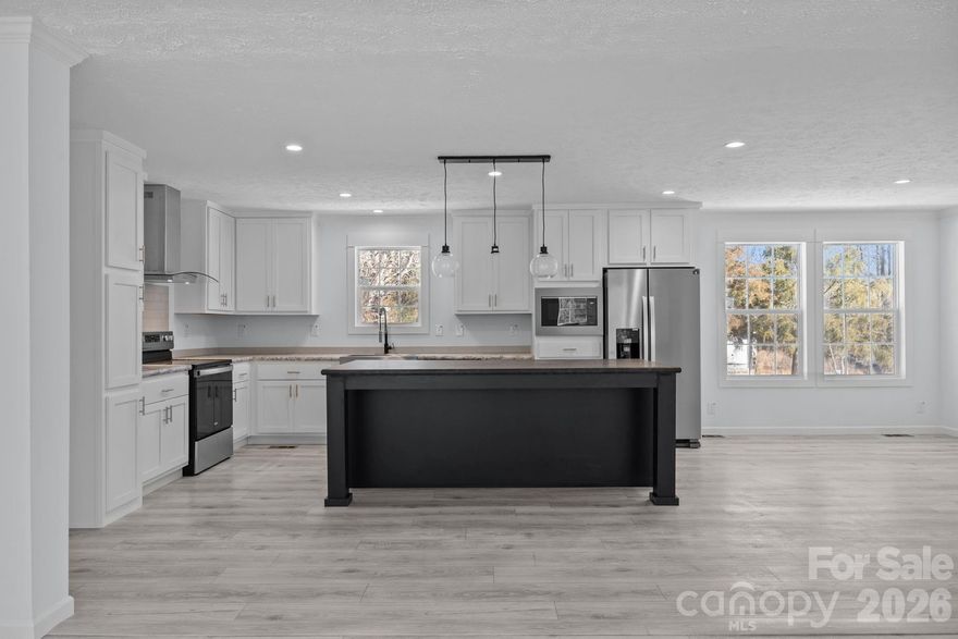 Step into modern perfection! This stunning, brand new 3 bed, 2 bath home delivers 2096 ft.² of bright, open living. The expansive kitchen island with bar seating is ready for your next gathering. Enjoy a massive walk-in pantry, a luxurious primary closet, and a split bedroom layout for privacy. Sitting on over half an acre with an 8 foot privacy fence, this home is move-in ready and waiting for you today!

- One or more photos have been virtually staged.