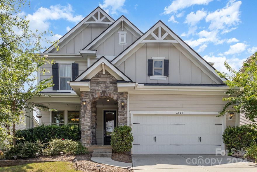 Reduced Price! Fall in love with this exceptional Fort Mill home in The Preserve at Riverchase. This charming, light-filled, and open floor plan will check all the boxes on your desirable home features list. Start your day enjoying your coffee at sunrise on the welcoming rocking-chair front porch. Pets or little ones can play safely in the fenced level back yard. Take a dip in the neighborhood pool or stroll and enjoy nature at the community picnic pavilion and play area. Launch your canoe on the beautiful Catawba River Blueway. Entertain your evening guests in the outdoor living area with a covered porch and expanded patio or in the two-story family room overlooked by a loft with full size pool table and adjacent media room. Retire to the spacious primary bedroom suite conveniently located on the main floor. Whether your day is busy or relaxing, this home will fulfil your living needs and desires for years to come. Hurry and schedule your visit today. This opportunity won’t last long.