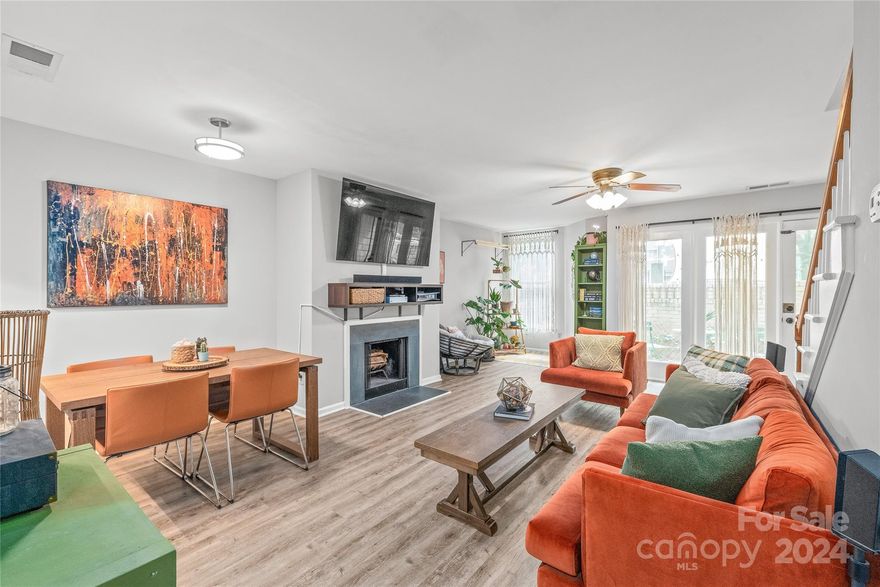 Discover urban living in this charming 2 story condo in Uptown's vibrant Third Ward, across from the Panthers practice facility & Johnson & Wales University. Offering modern amenities & prime location, this condo is perfect for those seeking convenience, walkability, & an active lifestyle. Upon entering on the 1st level you are greeted by the entry into the open great room, fireplace, & abundant natural light. Updated kitchen boasts granite countertops, a tile backsplash, & SS appliances. Enjoy LVP flooring on the 1st flr & enclosed patio. The primary bedroom offers a balcony overlooking a tree-lined street & an updated bathroom with tile floors and granite countertops.
This condo's desirable location ensures you're always close to the action. Whether its cheering on the Panthers & Charlotte FC at Bank of America Stadium, catching a Hornets game at Spectrum Center, touring the Truist Field, home of the Knights or strolling around Frazier Park...everything is just a short walk away.