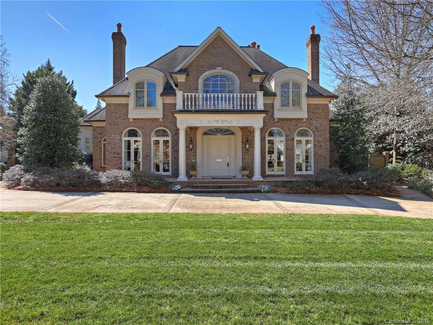 Beautiful custom home w/incredible attention to detail. 12 foot ceilings & 8 foot doors downstairs, 10 foot ceiling height upstairs. Remarkable 2 story foyer w/floating circular stairs, marble floors w/a beautiful view through the family room to French doors leading to the outdoor swimming pool. Downstairs master suite has his & her dressing areas as well as an oversized bathroom area. Upstairs has additional bedrooms, family room & exercise/dance studio. Attached 2 car/detached 3 car garages.