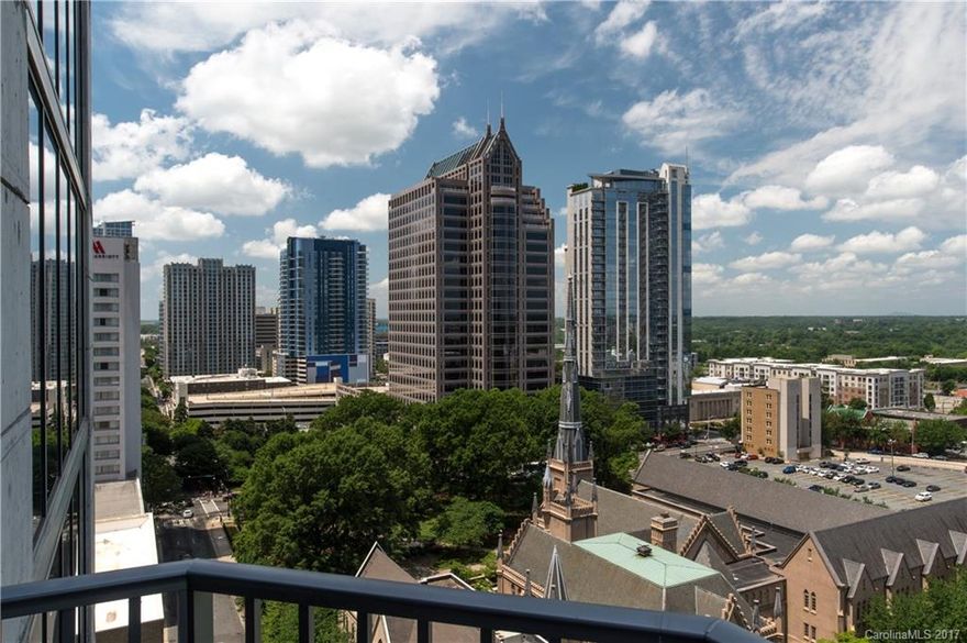 VIEW! This unit has prime West view (Panther's Stadium, City Buildings, and Sunset).  Most Desirable 1 Bed, 1 Bath Floor plan - Hardwood Floors, High Ceilings, Stainless Steel Appliances, Granite Counter Tops, High End Cabinets.  Expensive Automatic Blinds controlled with Remote.  Custom Wood Closet Organizer. Includes Deck Parking and STORAGE UNIT.  NEW A/C Unit with past year (9 yr warranty remaining). Convenient to BB&T Knights Stadium, Spectrum Arena, Blumenthal and Uptown Restaurants.