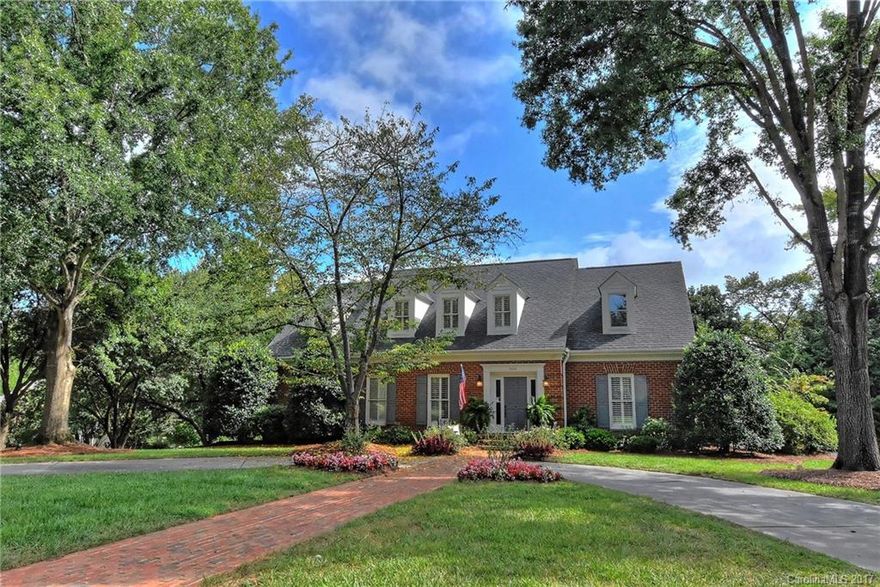 Updated full brick master down floor plan in popular Montibello!  Refinished HW floors throughout main level, hallway & bedrooms upstairs. 4BR/4 full baths plus hard to find bonus room above 2CAR garage. Updated kitchen features granite, built-in Subzero fridge, SS appliances, double ovens. Front and rear staircases. Recently added 26x16' screen porch w/ outdoor stone fireplace. Circular driveway.Study/Hobby Rm off kitchen. Fenced yard w/ brick storage building. Neutral Paint and move-in ready!