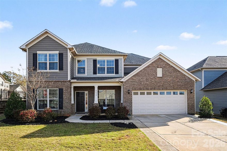 WATCH VIDEO TOUR! (If you're on Zillow go to Facts & Features - See More - Virtual Tour) 
Experience elevated living in this stunning Pulte-built home located in the highly desirable Queensbridge community of Indian Land. Offering over 3,100 square feet of thoughtfully designed space, this 4-bedroom, 2.5-bath residence blends timeless design with modern comfort.

From the moment you enter, you’re welcomed by a refined interior featuring elegant engineered hardwood flooring, a formal dining room, and a private office, creating the perfect balance of sophistication and functionality. The home opens into a spacious living area anchored by a gas fireplace, seamlessly flowing into a light-filled sunroom—ideal for both relaxing and entertaining.

At the heart of the home is a chef-inspired kitchen appointed with granite countertops, a natural gas cooktop, wall oven, expansive center island, walk-in pantry, and butler’s pantry, offering both style and practicality for hosting.

Upstairs, the owner’s retreat provides a peaceful escape with a generous layout, spa-like bath, and large walk-in closet. Three additional bedrooms, a full bath, and a versatile loft space offer flexibility for guests, media, or work-from-home needs, while the upper-level laundry room adds everyday convenience.

Step outside to enjoy a private backyard with patio, perfect for outdoor dining or quiet evenings. Additional highlights include a covered front porch, mudroom/drop zone, and 2-car garage.

Residents of Queensbridge enjoy access to resort-style amenities including a pool, recreation areas, playground, and scenic sidewalks, all just minutes from Ballantyne, top-rated schools, upscale dining, and shopping.