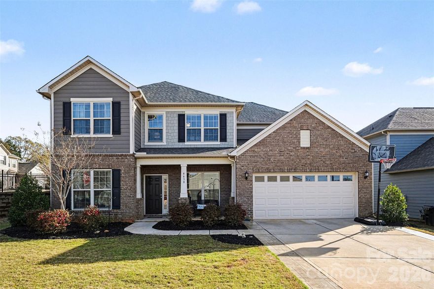 WATCH VIDEO TOUR! (If you're on Zillow go to Facts & Features - See More - Virtual Tour) 
Experience elevated living in this stunning Pulte-built home located in the highly desirable Queensbridge community of Indian Land. Offering over 3,100 square feet of thoughtfully designed space, this 4-bedroom, 2.5-bath residence blends timeless design with modern comfort.

From the moment you enter, you’re welcomed by a refined interior featuring elegant engineered hardwood flooring, a formal dining room, and a private office, creating the perfect balance of sophistication and functionality. The home opens into a spacious living area anchored by a gas fireplace, seamlessly flowing into a light-filled sunroom—ideal for both relaxing and entertaining.

At the heart of the home is a chef-inspired kitchen appointed with granite countertops, a natural gas cooktop, wall oven, expansive center island, walk-in pantry, and butler’s pantry, offering both style and practicality for hosting.

Upstairs, the owner’s retreat provides a peaceful escape with a generous layout, spa-like bath, and large walk-in closet. Three additional bedrooms, a full bath, and a versatile loft space offer flexibility for guests, media, or work-from-home needs, while the upper-level laundry room adds everyday convenience.

Step outside to enjoy a private backyard with patio, perfect for outdoor dining or quiet evenings. Additional highlights include a covered front porch, mudroom/drop zone, and 2-car garage.

Residents of Queensbridge enjoy access to resort-style amenities including a pool, recreation areas, playground, and scenic sidewalks, all just minutes from Ballantyne, top-rated schools, upscale dining, and shopping.