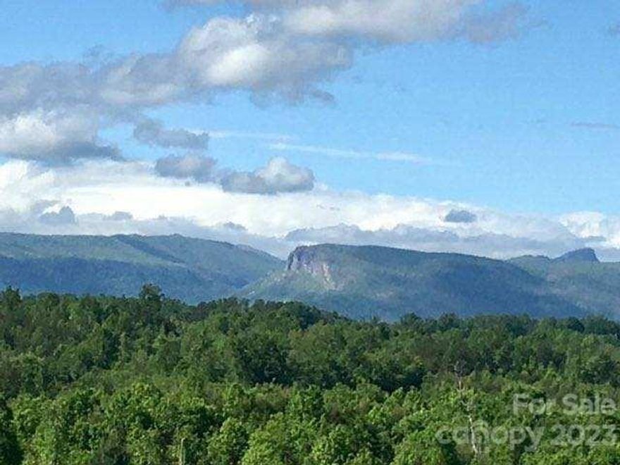 Beautiful mountain views surround this large acreage parcel that has great potential for future uses.   Magnificent views of Shortoff Mountain, TableRock, and the Blue Ridge Mountain range.  The property has several potential building sites for a private home/estate or future residential development potential.  Large creek flows thru the property along with deeded access to the front and back portions of the property both.  The property was timbered approximately 10 years ago and has a good trail system throughout and wildlife present.  Public water supply in the area for potential use.  Located minutes from I-40, Lake James, Marion Lake Club Golf Course, and Lake James State Park & more.  In addition you are an approx. 45 minute drive to Asheville and the Western North Carolina mountains. Acreage is an estimate only and will be surveyed prior to closing.