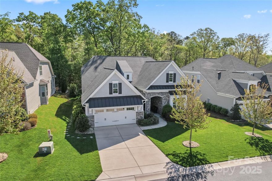This immaculate ranch by Toll Brothers is ready for you to call home! Step inside to a grand entry hall that leads to the stylish kitchen featuring quartz counters, oversized center island w. cabinetry underneath, 5-burner gas cooktop, & HUGE walk-in pantry by California Closets. The kitchen flows effortlessly into the family room, where cozy gatherings await under a tray ceiling & plenty of windows showcasing wooded views.  The spacious primary suite features a walk-in closet w. dressing table & luxury bath w. oversized shower & porcelain tile floors. Bedroom #2 is a generous size & shares a bath w. bedroom #3, which features built-ins — offering flexibility as an office or inviting guest room. Enjoying the outdoors is easy from the covered patio with built-in fire pit area that overlooks the woods & fenced, back yard. Additional features include a mud room w. computer niche, separate laundry with folding area & soaking sink, an oversized garage w. storage & 10' ceilings throughout.
