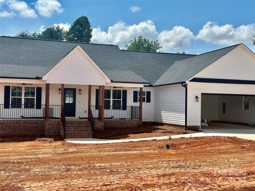 Discover the charm of  Storybrook with a country setting yet close proximity to restaurants and shopping.  This charming 1 story (Ranch) offers an open concept with 3 spacious bedrooms, 2 1/2 baths situated on .92 acres.  Enjoy the primary bedroom with a large walk-in closet, deluxe primary bath with tile surround shower and dual vanity.  Step onto the covered back porch with a large deck providing a serene space where you can relax and great for entertaining.  This home will have high quality finishes and stylish details throughout where meticulous craftsmanship meets comfortable living. Covered front porch and a 2 car over-sized garage. Projected completion date is 5/31/24.  Call Today! Your Dream Home Awaits!