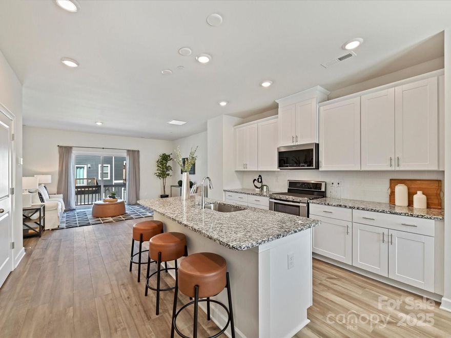***OPEN HOUSE on 5/17 cancelled due to property going under contract***Welcome Home to 2610 Greenmarket Drive! Built in 2021 by Meritage, this highly energy efficient 4 BR, 3.5 bath townhome has barely been lived in so why wait for a new build? It features a 2-car side by side garage & lots of guest parking in front of the townhome. Located in the quaint community Enclave at City Park & within min to popular LoSo, the Lightrail, the CLT Farmers Market & CLT Douglas Airport, the location cannot be beat! Nature lovers will enjoy walking the trails at nearby Renaissance Park. The townhome features a lower level BR w/ it's own en-suite bath. Enjoy the open layout of the upper level that is centered around a beautiful kitchen or relaxing outside on your balcony. The kitchen features white soft close cabinets, a GAS range & upgraded ss appl. Kitchen refrigerator, washer & dryer to remain!