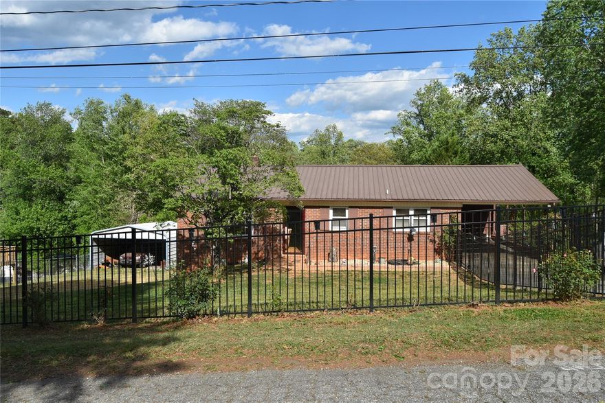Updated brick ranch with full basement on dead end street. Beautiful hardwood floors in large open flowing living area. The bedrooms are serviced by a hall bath.  Guests are serviced by a half bath. One bedroom has been converted to a laundry but could be converted back to a traditional bedroom. The full basement has some finished areas, a full kitchen and a second laundry room and partitioned rooms in addition to workshop areas. The potential is endless for further expansion.  The yard is completely fenced for pets or children safety. The back yard is also fenced and has a large salt water pool. The pool area has a gazebo and features a cleaning system for the pool. The side yard features the double detached carport. The HVAC is only 3 years old among other updates. The location is near major road access, schools, grocery stores and shopping.