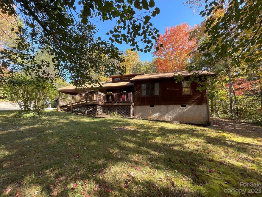Great 1-level rustic home located in the Hankins Road area near Lake James.  Home is situated at the front of this one acre lot leaving extra growing space in the back.  Surrounded by trees and nature, it is very private.  A nice outbuilding is on the property for storage or possible workshop.  Enjoy the large front deck for quiet time or for entertaining guests.  French doors in living room lead to the back deck with more yard to enjoy.  The remaining land is wooded and has great potential for other buildings, gardens, play area, etc.

It is close to the lake for all your outdoor activities and is in close proximity to the by-pass for easier access to I-40.
Or you can jump on Hwy 221 to Spruce Pine or Burnsville.  Downtown Marion is just minutes away for all your eating and shopping needs.