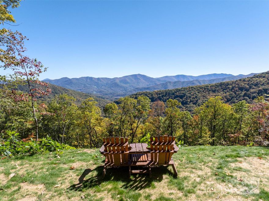 Experience mountain living at its finest in The Villages of Plott Creek, one of Waynesville’s most sought-after gated communities just minutes from historic downtown and an easy drive to Asheville. This exceptional 1.9-acre lot showcases expansive, multi-layered mountain views that stretch for miles, capturing the essence of Western North Carolina’s natural beauty. Thoughtfully prepped for an effortless start, the property features a preliminary driveway with road-bond gravel, a graded house pad, fresh hydroseeding, four-bedroom septic approval, and a well construction permit already in place. With much of the groundwork complete, you can focus on designing and building your dream home instead of months of excavation and permitting. As an added bonus, the seller will pay the initiation fee for your choice of membership level (Social, Sports, or Golf) at the esteemed Laurel Ridge Country Club offering the perfect blend of luxury mountain living and lifestyle convenience.