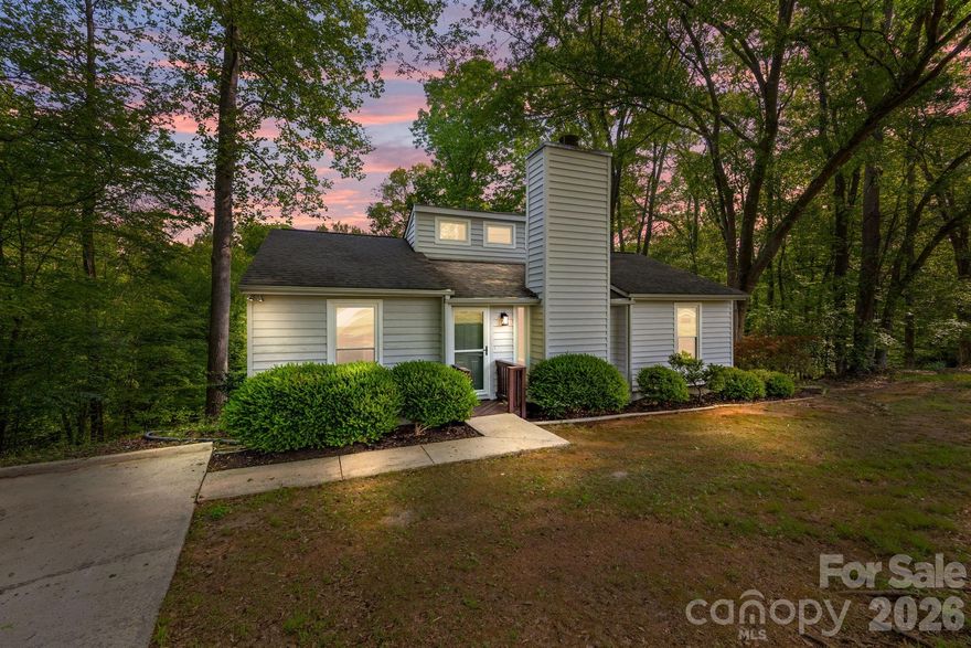 What a find! Tucked away on a full 1-acre lot at the back of a quiet neighborhood just off Morehead Rd in the heart of Harrisburg, this beautifully renovated home offers the perfect blend of privacy, charm, and everyday ease. Enjoy peaceful mornings and relaxing evenings overlooking Mallard Creek, ideal for admiring the springtime scenes or even casting a line for fish!

Inside, the home has been completely transformed with a warm, modern design and thoughtful finishes throughout. The open, light-filled living space features two-story ceilings with skylights and a stunning natural stone fireplace, complemented by new flooring, fresh paint, and updated lighting. The kitchen shines with refreshed cabinetry, quartz countertops, upgraded oil-rubbed bronze hardware, and a stylish backsplash, while both bathrooms have been fully updated with matching quartz surfaces and cohesive, high-end finishes. Combined with a seller-paid one-year home warranty for peace of mind, this home is ready for you to move right in and enjoy! 

Located in an established neighborhood with no HOA, you'll love the convenience of being close to shops, dining, and recreation in this growing and vibrant area of Cabarrus County. With its rare combination of a large, private, stream-backed lot, turn-key condition, and sought-after Harrisburg location, this home is a standout opportunity you won’t want to miss.