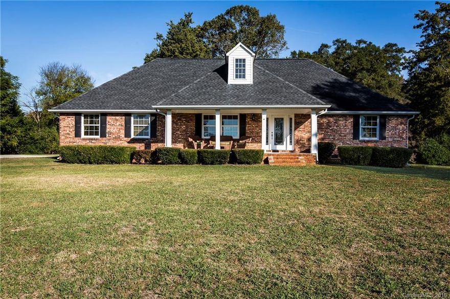 3940 Mockingbird Ln Rock Hill, SC Presents Full Brick Ranch w/Lg Det. Garage on 2 Ac. w/Est. Oak & Pecan Trees, NO HOA & LOW CO. TAXES. This 4BR w/Bonus, 3BA, 1 level Home offers an Open Floor Plan & Custom UPGRADES GALORE: State of Art Chef’s Kitchen w/HUGE Frig, Gas Stove, Stainless Appl, & Granite C-Tops.  Wow at the Gleaming HW & Custom Tile Flooring, Arch. features that highlight Wood Beams in FR & Coffered Ceiling in BR. Newer Arch. Roof & Concrete Dr. CLEAN AS A WHISTLE!