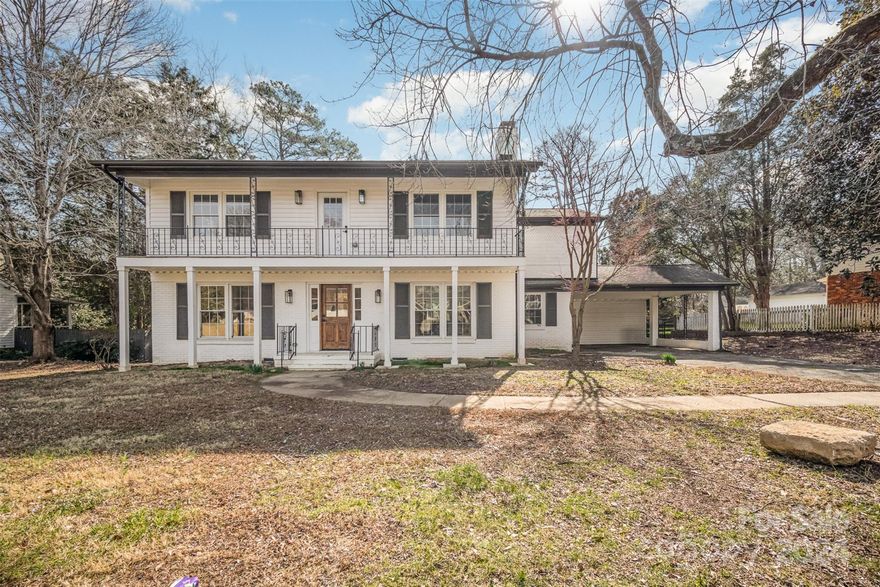 Beautifully refinished 4-bedroom 2.5 full bath home, with low maintenance flooring and gorgeous kitchen featuring updated solid countertops, white shaker cabinets, subway tile, stainless steel appliances, built-in microwave and cooking with gas! Take full advantage of this huge 1/2 lot with large deck offering privacy and plenty of family fun. Upstairs the primary bath has a spa like feel with Carrera tile floors double vanity sink, walk-in shower, standalone tub. The roof was replaced in 2020. Relaxing warm neutral paint really makes this a warm and inviting home. Awesome south Charlotte location. This home is must see! Come see this today