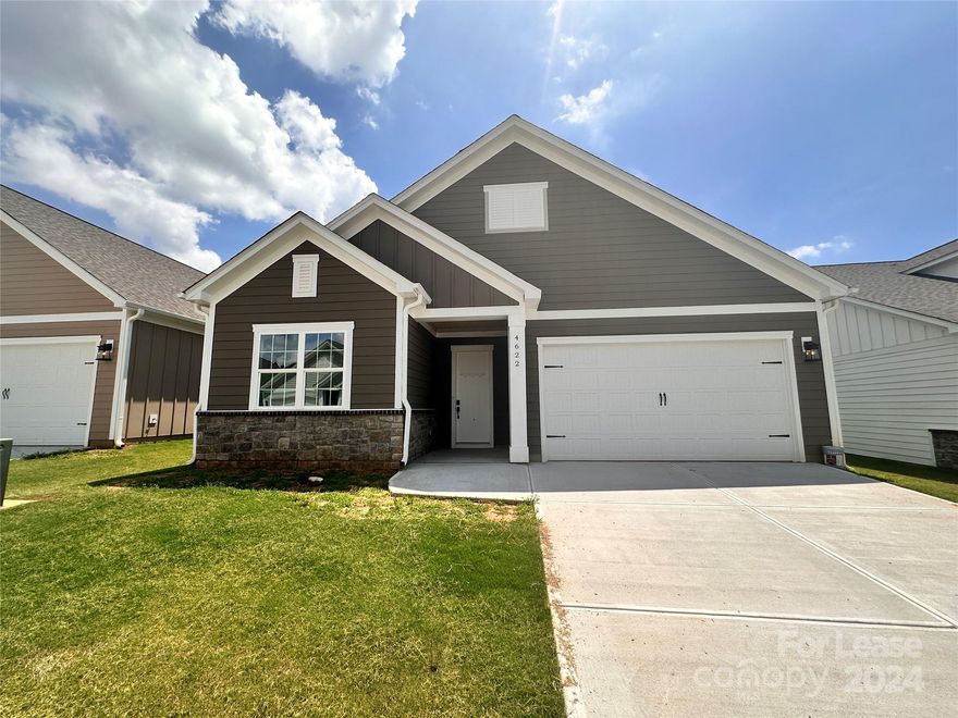 NEW CONSTRUCTION! This home feels bright and spacious with 10' ceilings and extra wide hallways and has a wonderful open floorplan great for entertaining and everyday living. You will love the well-designed kitchen with oversized island, gorgeous cabinets, granite countertops, and stainless steel appliances all included. The kitchen is open to the great room and dining area. The spacious primary suite features a tray ceiling and lots of windows. The ensuite bath includes a fully tiled walk-in shower, large walk-in closet and double vanities. The additional two bedrooms share another full bath with a tub/shower. Bedroom 3 could be easily used as an office. Luxury vinyl plank flooring throughout. Covered Patio! Pets are welcome! Lawn Maintenance is Included!