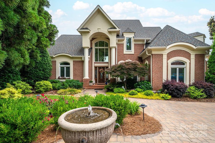 It’s all about the view—and what a view it is! This Lake Norman property showcases breathtaking waterfront vistas that will captivate you from the moment you arrive. Nestled on a quiet cul-de-sac, the beautifully landscaped half-acre lot offers 180 feet of shoreline and an unparalleled setting for lake living.

The 4-bedroom, 4.5-bath home includes an updated kitchen, loft, exercise room, and multiple attic storage spaces, providing both comfort and functionality. Outdoors, the oversized private dock is a dream—featuring a boat lift, two jet ski lifts, and a swim platform. The property also holds preliminary approval for a pool, and as an impervious-exempt lot, it allows greater flexibility for future enhancements.

Every detail has been thoughtfully cared for, with additional features and updates available in the MLS attachments. This is a rare opportunity to own a true Lake Norman gem!