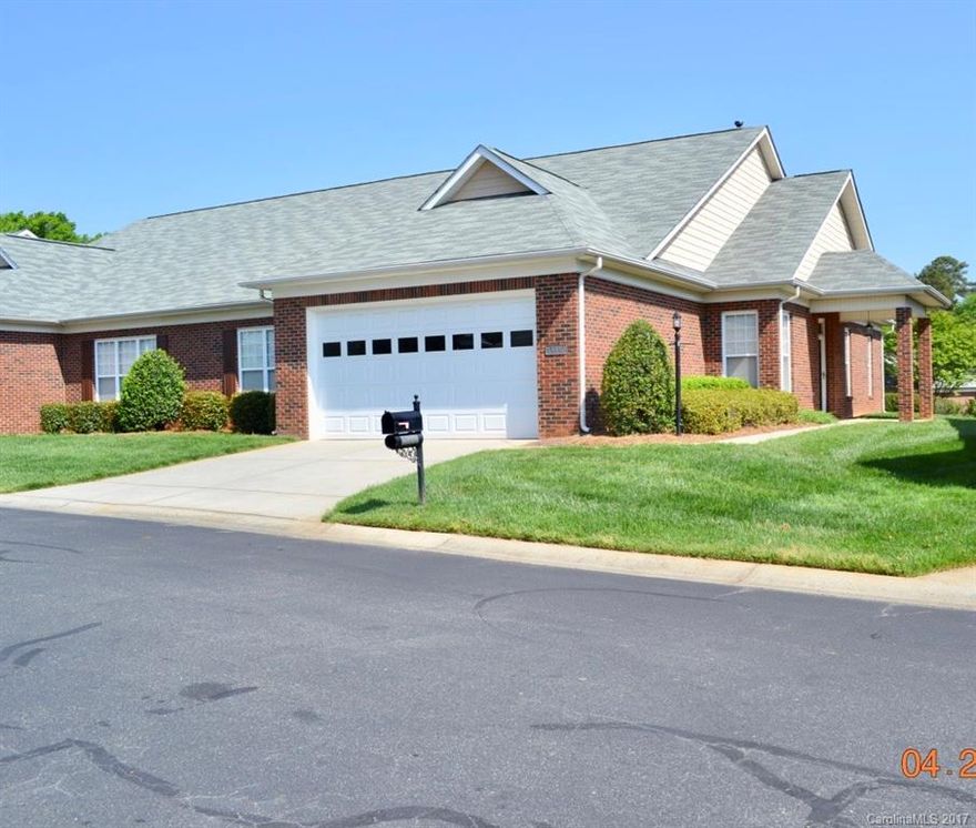 Updated with hardwoods in main living areas, quite community convenient to shopping & Dinning.  Front Bedroom can be used as an office, large closets, sunroom, full brick.  Lawn care is included move in ready.