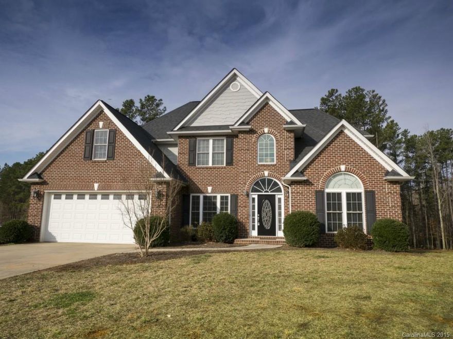 Custom quality, all brick home on almost an acre. Open floor plan w/ beautiful HW & tile floors, gourmet kitchen, Great Room w/gas log fireplace.  Oversized master bedroom suite on main w/luxurious master bath, 4 spacious bedrooms upstairs. UPGRADES GALORE.  New Nature Preserve nearby! Easy access Hwy 16 for easy commute to CLT & Airport. CALL AGENT FOR INFORMATION TO UPGRADE SEPTIC SYSTEM TO MAKE THIS A 4 OR 5 BEDROOM HOME.