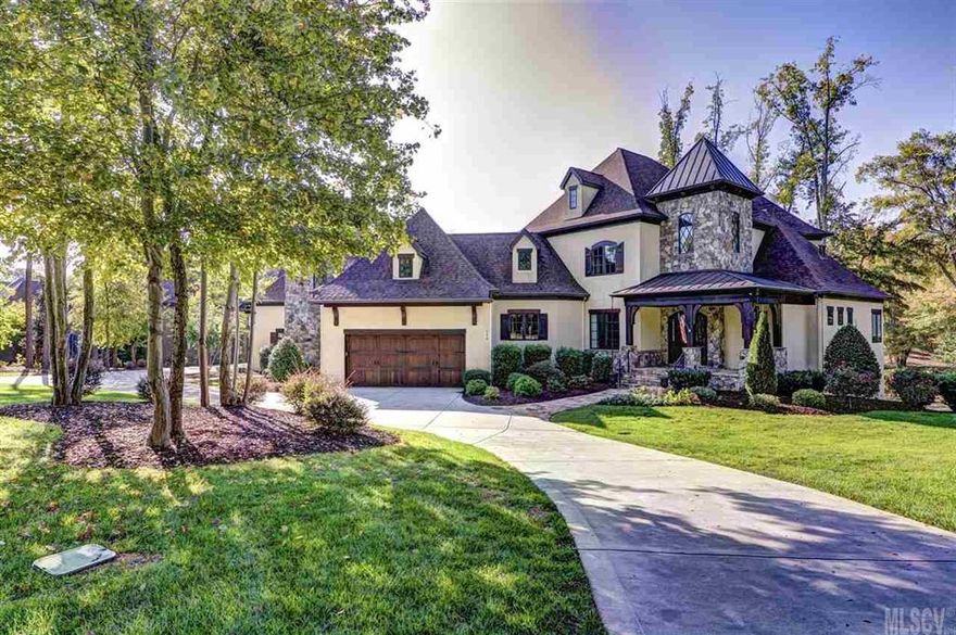 This richly appointed waterfront residence is located in The Point at Trump National Golf Club. Welcome to old world charm and a versatile floor plan fit for every lifestyle.The open layout makes it easy to entertain your friends and family. Spectacular salt water pool and outdoor living with beautiful views of Lake Norman. Gourmet kitchen is a chefs playground.Stunning details around every corner, hardwoods, beamed ceilings, stacked stone and exquisite tile and marbles throughout. 4 car attached garage.