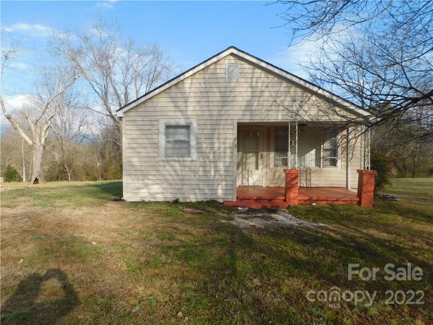 Cozy 2 bedroom, 1 bath home located in the Drexel area.  This home features hardwood floors, open kitchen with ample cabinet space, and a rear deck for outdoor dining and grilling.  Home is located on a large .7 acre level lot with plenty of room for outside activities.