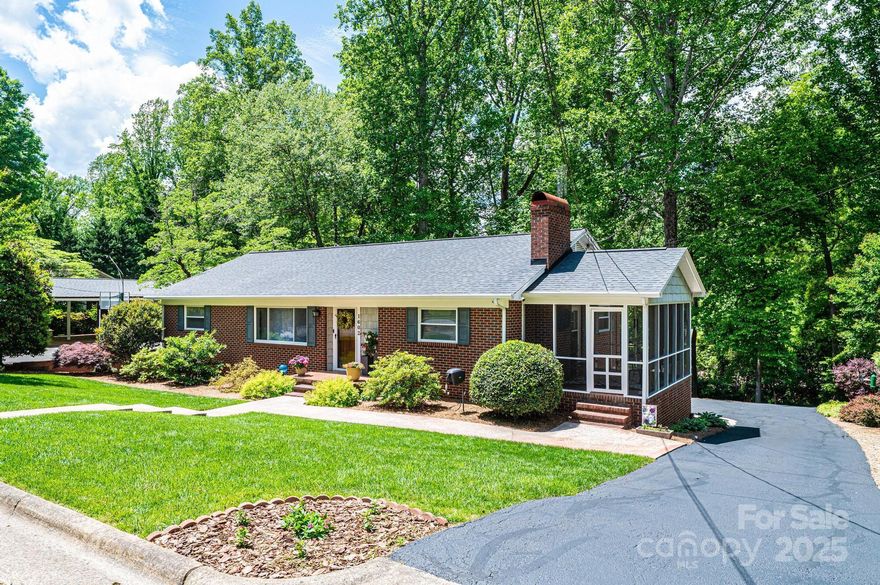 IMMACULATELY MAINTAINED! Beautiful Brick Ranch w/Vinyl Trim & Gingerbread Siding; Broken tile front porch; Gorgeous Solid Wood front door leads you into a beautiful living rm; Open Kit/Din (or den) area is so spacious & offers brick FP w/ventless gas logs, built-in bookcase, cer tile flrs, solid wood cabinets in excellent condition that extend to the ceiling for tons of storage & tile countertops & backsplash. All appliances convey. This area has side door to a large screen porch (new screens & framing 2020) w/broken tile floor. 2 large spare BRs (the one currently used as an office has exterior door to rear deck); Full Hall BA w/stackable (2022) washer/dryer, large vanity; tile flrs & walls & tub/shower; Primary Suite w/hdwd flrs, crown molding & full BA w/pedestal sink & tile shower; Full Unfin Bsmt is super clean/dry w/concrete flr & sgl gar door w/opener. NEW ROOF being installed within weeks! 2019 HVAC; 2018 new deck, 2025 sealed asphalt; TONS more updates...full list available!