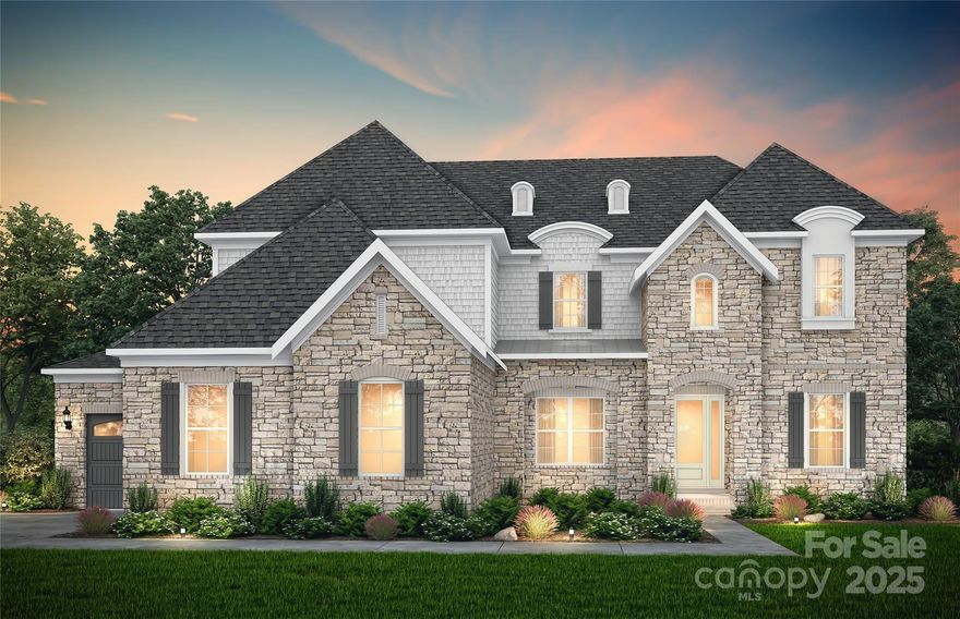 Beautiful full brick and stone basement home. This home has it all, spacious gathering room w/gorgeous brick corner fireplace, coffered ceiling & abundant natural light.  Beautifully appointed gourmet kitchen with KitchenAid appliances, extended cabinets and light filled café. Private second floor owner's suite with spa bath which includes large shower and free-standing tub.   Spacious grand custom closet features center island, window seat and custom closet shelving. Spacious second floor rec room.  Secondary bedrooms all with great closet space.  Partially finished basement with recreation room, media room, sunroom, bedroom & full bath. Beautiful private rear yard complete with screened lanai and extended deck backed up to 11-acre community lake.  Oversized 3 car garage.  Storage Galore!