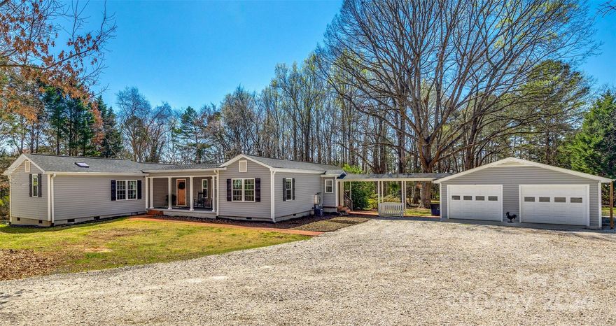 Escape to your own retreat buffered from Mt. Gallant Road by a dense wooded area. This charming three-bedroom, two-bathroom home offers tranquility and seclusion, perfect for those seeking solace in nature's embrace. This haven seamlessly blends comfort & serenity with a uniquely welcoming charm. Throughout, you’ll find spacious living areas, rooms bathed in natural light from the skylights above, many modern amenities and design features allowing ample opportunity to enjoy the beauty of the +/- 4.16 Acres the home is sitting upon. At the rear of the home is an expansive deck which is ideal for al fresco dining or simply unwinding in the fresh air under the covered sitting area. Whether you're seeking a retreat or a permanent oasis, this secluded and wooded property beckons you to relax, recharge, and reconnect with nature while boasting its highly sought after location, location, location. Schedule your showing today!