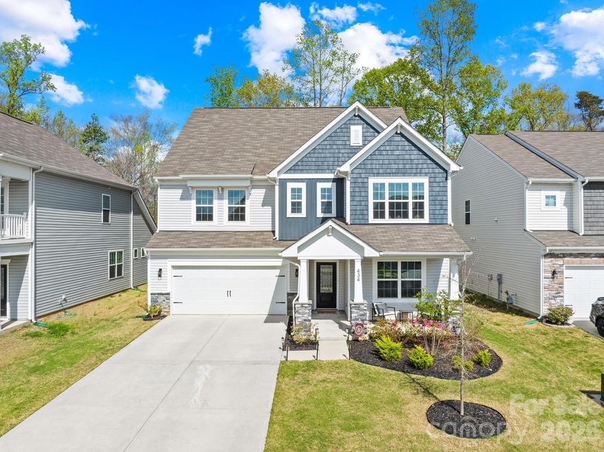 Welcome to 434 Kennerly Center Drive! Located in the desirable community of Gambill Forest, this home is just 6 minutes from downtown Mooresville and 15 minutes from Lake Norman.

Although this home was built just two and a half years ago, it feels better than new construction. This 3,694-square-foot, 6-bedroom, 4.5-bath home has been incredibly well maintained, and the sellers have added value with custom touches throughout.

The main level features luxury vinyl plank flooring, quartz countertops, gas appliances, and has recently been repainted throughout much of the home. The kitchen includes upgraded appliances, a Dutch oven, additional cabinetry, and expanded countertops with a large center island.

The second level offers five bedrooms and three full bathrooms, with one bedroom easily functioning as a large bonus room. The third level boasts an impressive den or man cave area.

In addition, there is a full bedroom and bathroom on the third level, providing excellent flexibility.

This particular lot is especially unique, as it backs up to a private wooded tract, offering an abundance of privacy. The sellers have also enhanced the backyard outdoor living space, adding even more value and appeal.

The home is equipped with full underground utilities, including city water, city sewer, natural gas, high-speed internet, and power—providing both convenience and reliability.

Call or text the listing agent today to schedule your tour and discover just how spectacular this home truly is!