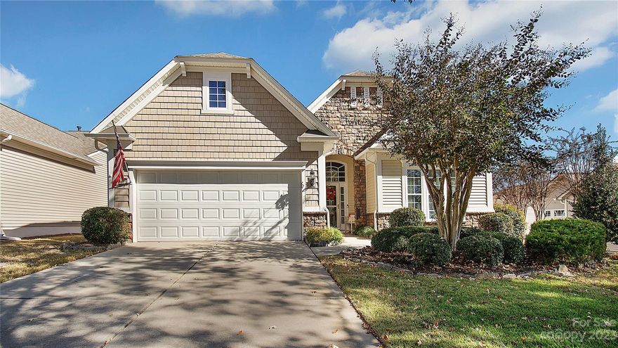 Charming ranch home in desired Sun City Carolina Lakes 55+ community. MOVE-IN READY! This Willow Bend home boasts lots of natural light & wood floors throughout the living spaces. Enjoy your gourmet eat-in kitchen complete w/granite countertops, breakfast nook, stainless steel appliances, kitchen island, & computer niche. The dining area & great room is the perfect open space for entertaining with a gas fireplace. The primary suite is nestled privately off the back of the home w/tray ceiling, an upgraded ensuite bath, and a large walk-in closet. Split secondary BR & Flex space w/double glass doors perfect for office, or craft room. Enjoy the beautiful sunroom featuring EasyBreeze windows. The back patio with pavers includes a gas firepit. Extensive landscaping and in-ground irrigation. New roof 2023. Check out the wonderful community amenities: Golf, tennis, pickleball courts, 2 clubhouses, pools, walking paths, community clubs, and more. Minutes from shopping, grocery & restaurants.