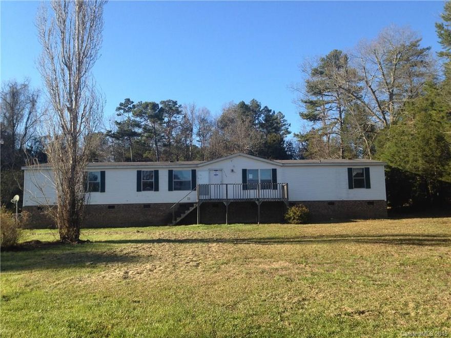 Foreclosure more than ***** $46,000 **** below tax value.  Split bedroom plan, Master bedroom with office,  Living room, Dining room and Den with Fireplace.  Sold as is seller will not repair.  Buyer will have to have a well put in as the well is not on the lot with the house and part of drive way appears to be on the other lot and is not  included.  Sold as is sell will not address any of these issues.