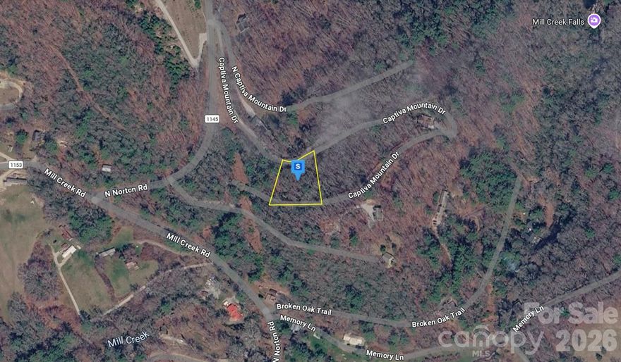 Explore this beautiful 0.78-acre vacant lot in the Captiva Mountain subdivision of Jackson, NC, offering a peaceful mountain setting with stunning lake views. The property features wooded and sloped terrain, ideal for a custom home that blends into the natural landscape while maximizing scenic surroundings. Residents enjoy community amenities including gravel road access, deeded water access, and a shared dock, perfect for relaxing by the lake. With access to a shared well and septic required, this community provides a unique opportunity to build in a private, nature-filled environment.
