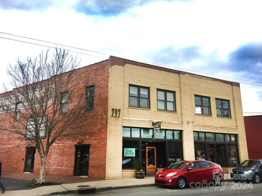 Renovated 1920's building with great visibility on hip Haywood Rd
Suite 202 : 1,225 rentable square feet with open floor plan, wood floors, 1920's tin ceilings, and great south facing windows.
Suites 001 - 006 : 2,370 useable square feet with both individual offices and one large open room.
Suites 001 - 004 : these are offered as individual suites, 001 has a window, the others do not.
Suite 006 : 1,340 square feet of open office space with several windows.
Parking is available on site. Owner is a licensed NC Broker.