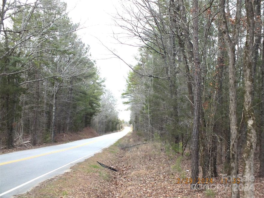 Large plot of land ready for your use, whether looking to build a private home or a investor looking to develop, this is 34.78 acres of wooded land, located between Hwy 521 and North 200 on Craig Farm and less than a mile to the NC state line. Great access to all surrounding areas. New plat with topo map included. land starts about half way between the 2 roads for Glenn Dr, there is a red X on the tree with a  blue stake, land ends where the cleared land starts and goes back to the clear land starts, this property is completely wooded, the second entrance for Glenn is on this property. Land drops off in the middle which could be a possible pond site