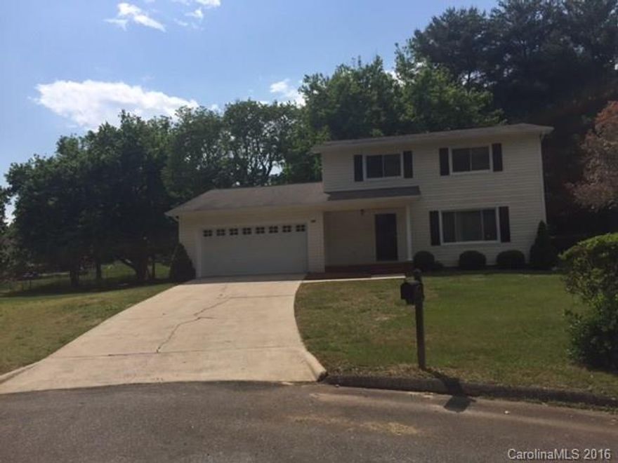 Move in ready home with 4  bedrooms, 2 car garage on a culdesac lot. Step down den custom built bookshelves and brick fireplace. Large patio in back for cookouts.  Spacious, flat yard with  detached storage. Near major highways, shopping and schools.