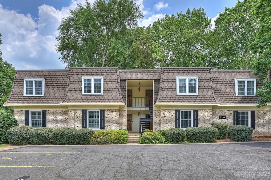 Stunning first floor unit in fantastic location – right in the heart of EVERYTHING SouthPark has to offer!  Freshly painted and immaculate! Beautifully updated kitchen with quartzite countertops, white soft-close cabinets, subway tile backsplash, and new SS appliances (installed June 2023). Handsome bamboo engineered hardwoods in LR, DR, Sunroom and hall.  Spacious living room w/gas log fireplace.  Sunroom offers great space for home office, den, or playroom, and leads to a beautiful, quiet courtyard. Closet organizer systems in both bedrooms. HOA dues cover heat/air, gas, basic cable, pest control, water/sewer, grounds, and pool/clubhouse. Trianon condos were under contract to be sold to a developer, but that sale did not close, and there is no current plan to sell the properties. This is a wonderful opportunity to live in desirable SouthPark!