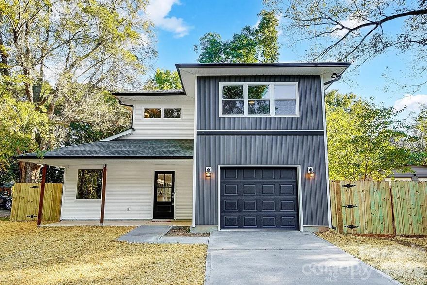 This beautiful custom house, offers an ideal blend space, functionality, and modern design. Inside, the house features a well-designed layout with abundant natural light throughout, including bright kitchen to open to the main living area and over looks the back yard. There is a formal room that can be used as dining room or an office The kitchen has a pantry, island and custom cabinets and granite courter space. the spacious primary suite is on the second level with large windows, and suite bath with shower and two sinks with vanity in between and large walk-in closet. Conveniently located with easy access to the Uptown Charlotte, as well as shopping, dinning and major highways, this home offers a unique blend of modern living space, and tranquility in a highly desirable location.