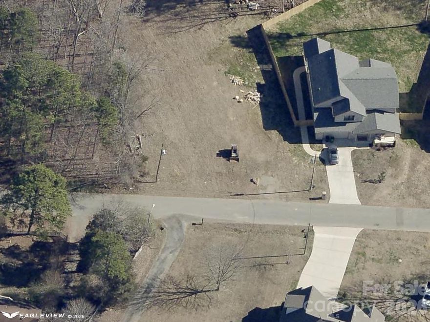 Build your dream home on this spacious lot located in a well-established neighborhood with no HOA—offering freedom and flexibility for your vision. Enjoy the peace and privacy of a residential setting while staying close to the conveniences of city life. Tap fees for water and sewer already paid by current owner. Easy access to major highways, shopping, dining, and Uptown Charlotte. A rare opportunity to own land in a desirable and growing area of the city. Bring your own builder and make it yours!
