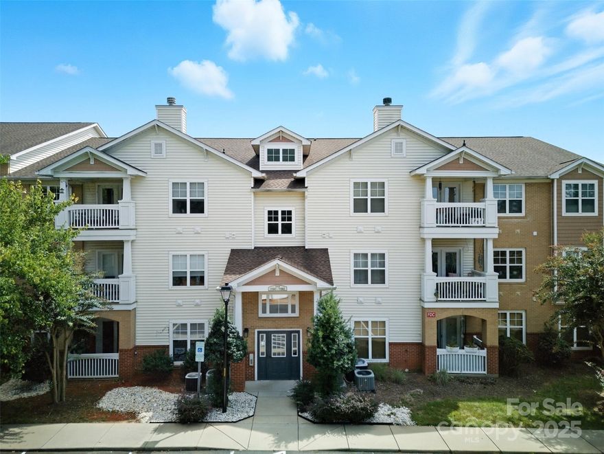Welcome to affordable penthouse living in peaceful Copper Ridge! **$1,000 flooring credit being offered!** This third-floor condo features two spacious bedrooms PLUS an office/flex room & two full bathrooms. With an open floor plan, vaulted ceilings, a wood-burning fireplace, and plenty of storage, this home is a must-see! Recently painted walls create a bright and airy atmosphere. The primary suite includes a walk-in closet and an ensuite bathroom with a vanity and shower. Enjoy entertaining on the covered porch, and take advantage of the community amenities, including a clubhouse, outdoor pool, tennis court, and communal spaces (just a building over!)—all while your HOA dues cover your water bill! This is a fantastic opportunity to live near the Ballantyne Bowl and Village, with easy access to South Charlotte, Fort Mill, SouthPark, and more—all at an attractive price point! FHA APPROVED!