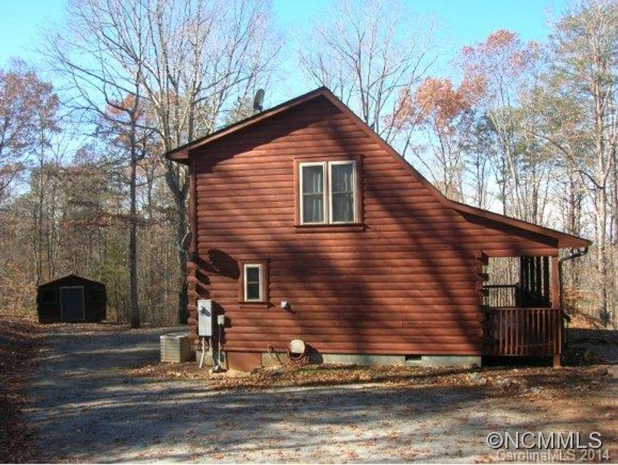 Cabin on 2.19 acres with a mountain view and PRIVACY! Main floor features a family room with FP/gas logs, eat-in kitchen, diningroom, and a full bath/laundry! 2nd. floor with master bedroom with walk-in closet, master bath/shower only, and sleeper loft! Common Area on Broad River with picnic and play ground area! Conveniently located to Tryon International Equestrian Center, Cleghorn Golf and Country Club with easy access to Hwy 74 By Pass!