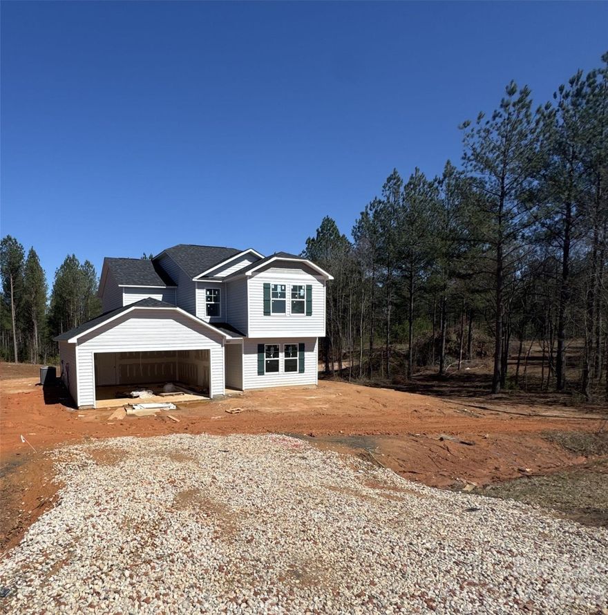 Welcome to this beautiful new construction home in Mooresboro, NC, offering approximately 2,200 sq ft with a spacious open floor plan. The kitchen features granite countertops, a kitchen island with seating, and a stainless-steel appliance package that includes a flat-top range, over-the-range microwave, and dishwasher. This home offers two primary bedrooms—one located downstairs and one upstairs—along with two additional bedrooms, a flex room upstairs, and 3.5 bathrooms. The open layout is perfect for entertaining or simply spending quality time with family. Conveniently located near many main attractions, this home is a must-see.