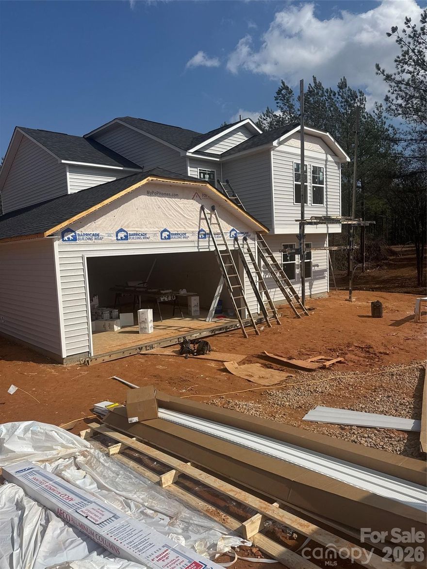 Welcome to this beautiful new construction home in Mooresboro, NC, offering approximately 2,200 sq ft with a spacious open floor plan. The kitchen features granite countertops, a kitchen island with seating, and a stainless-steel appliance package that includes a flat-top range, over-the-range microwave, and dishwasher. This home offers two primary bedrooms—one located downstairs and one upstairs—along with two additional bedrooms, a flex room upstairs, and 3.5 bathrooms. The open layout is perfect for entertaining or simply spending quality time with family. Conveniently located near many main attractions, this home is a must-see.