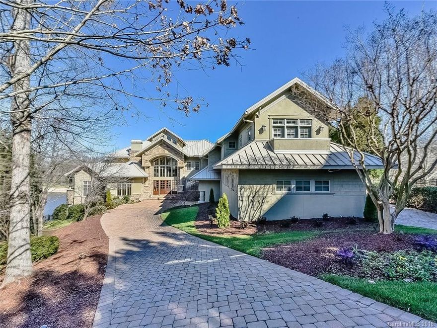 Peaceful cul-de-sac location - spectacular views of BCC 12th hole & lake; Stunning gated, fenced 3-level estate; Low maintenance tin roof;  5 fpls; Gourmet kitchen-Wolf 6-burner gas cooktop with griddle; Refinished hardwoods; Amazing entertainment features;  Fully equipped media & exercise rooms; 1400+ bottle wine cellar; Salt water pool with access to pool full bath; Garages for up to 4 vehicles +porte cochere; 3 terraces; Screened porch; Entire house generator; BCC golf membership available.