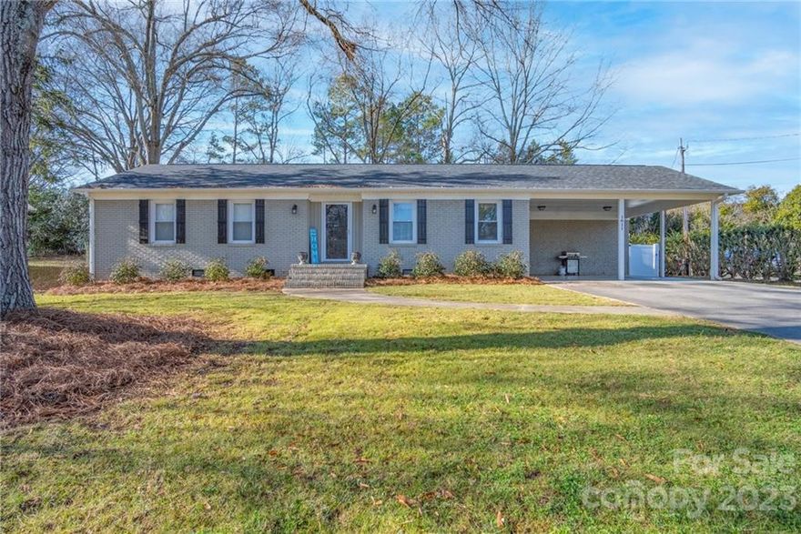 Welcome home to this one-story beauty!  Featuring three bedrooms, two baths with granite countertops, family room, large kitchen with dining area, and a spacious laundry room, this home has much to offer buyers.  The kitchen has white cabinets, granite countertops, and stainless appliances.  Luxury vinyl plank flooring is throughout the main living area and the bedrooms are carpeted.  The entire home was updated in 2020!  In addition to this, enjoy a two-car carport attached to the home, a large outdoor building, and a new white fence enclosing the backyard.  Located in a great area close to grocery stores, shopping, restaurants, and medical offices, this home is a rare find.  Come see all that it offers you!  Seller would prefer a possible lease-back for a short period of time.