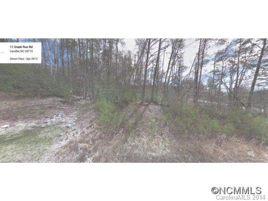 **Motivated Sellers**Beautiful wooded lot with long range, year round mountain views.  This is the largest lot in this subdivision of beautiful homes.  Great price on a lot in a very convenient area of Candler.  Off frame modular and stick built ok.