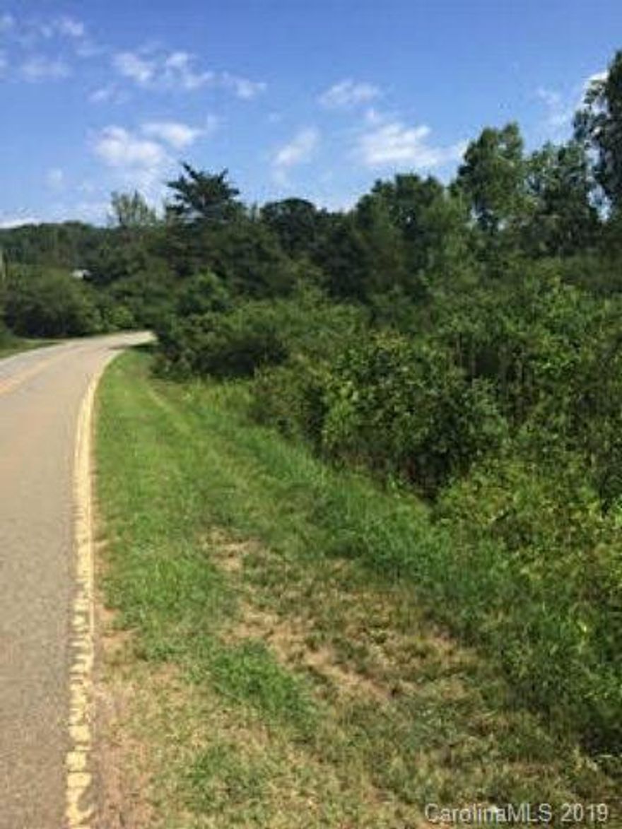 The lot gently slopes making it a perfect mobile home site or for a single family with a basement! Subject property backs up to a community pond.