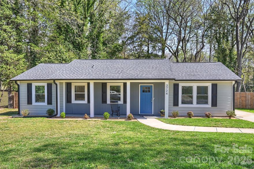 Completely renovated from top to bottom in 2024, this move-in-ready 3-bedroom, 2-bath home offers 1,362 square feet of modern living in the established Windsor Park neighborhood. Designed for both everyday comfort and entertaining, the open floor plan features a spacious living room with recessed lighting that flows seamlessly into the bright, updated kitchen and dining area. The kitchen is a true standout, featuring white cabinetry, quartz countertops, a classic subway tile backsplash, and stainless-steel appliances. Both bathrooms have been fully renovated with new tubs and showers, updated flooring, and stylish vanities with ample storage. Major system upgrades include the roof, gutters, windows, interior and exterior doors, electrical panel, and a tankless water heater, offering low-maintenance living and long-term peace of mind. Step outside to enjoy the newly built deck and privacy fence that enclose a large backyard; perfect for relaxing, entertaining, or hosting gatherings. Ideally located near Plaza Midwood, Center City, NoDa, and all that East Charlotte has to offer, this home blends neighborhood charm with modern updates in a highly convenient setting.