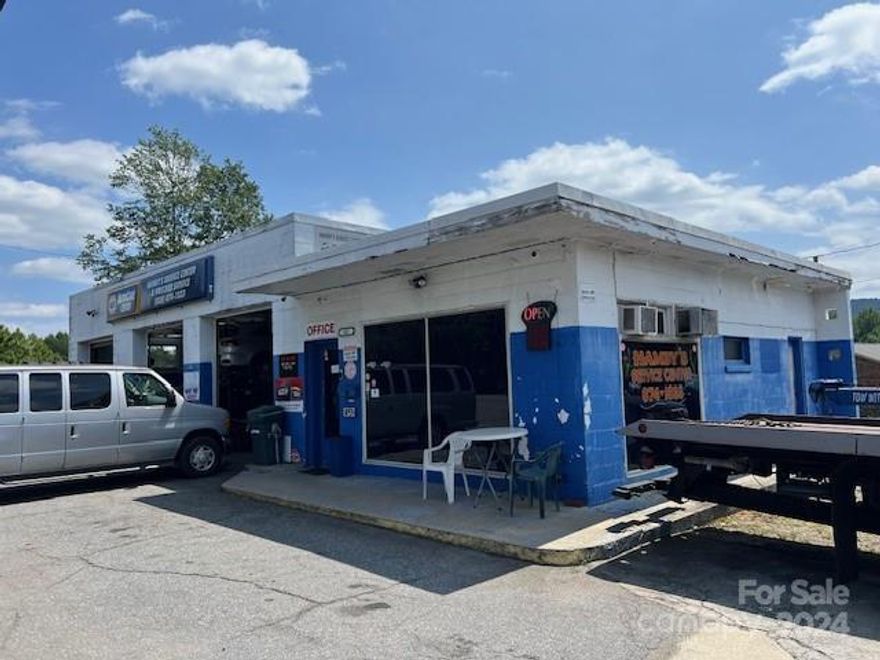 This 3-bay service garage sits at a high-visibility hard corner with direct access to I-40, offering unparalleled convenience and exposure. With over 14,500 vehicles passing by daily on Malcolm Blvd, your business will benefit from incredible traffic flow and accessibility.  This versatile property can accommodate many business uses or has the potential for redevelopment.